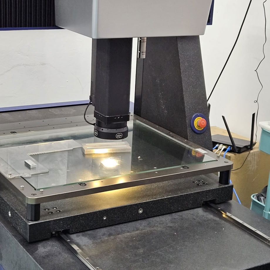 Close-up of knife testing machine in Solingen, showcasing precision engineering.