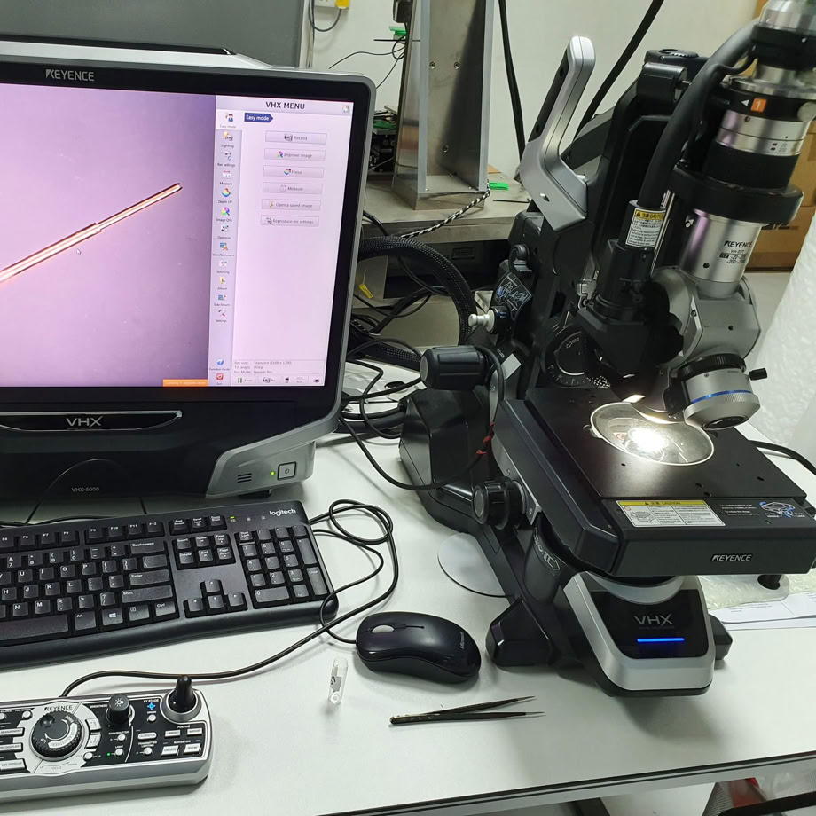 Close-up of knife testing machine in Solingen, showcasing precision engineering.